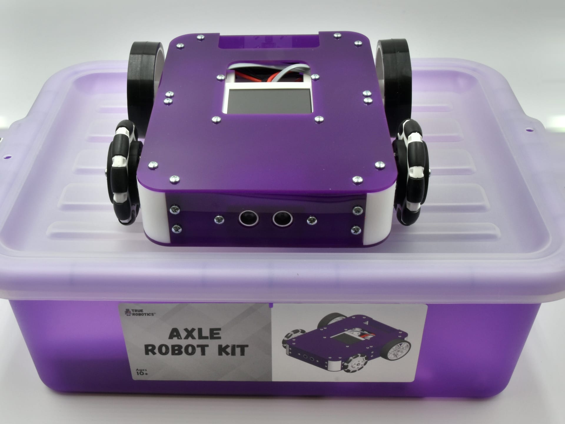 An assembled Axle Robot Kit sits on the lid of its purple kit box, labelled Axle Robot Kit